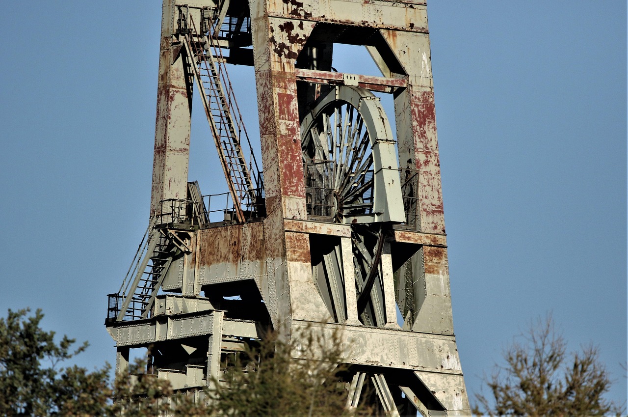 Visual representation of mining profitability headframe, mine, mine shaft, shaft, shaft sinking, shaft mining, tower, rusty, mining, industrial, coal, industry, wheel, vintage, pit, fuel, steel, structure, rust, mine, mine shaft, mine shaft, mine shaft, mine shaft, mine shaft, mining