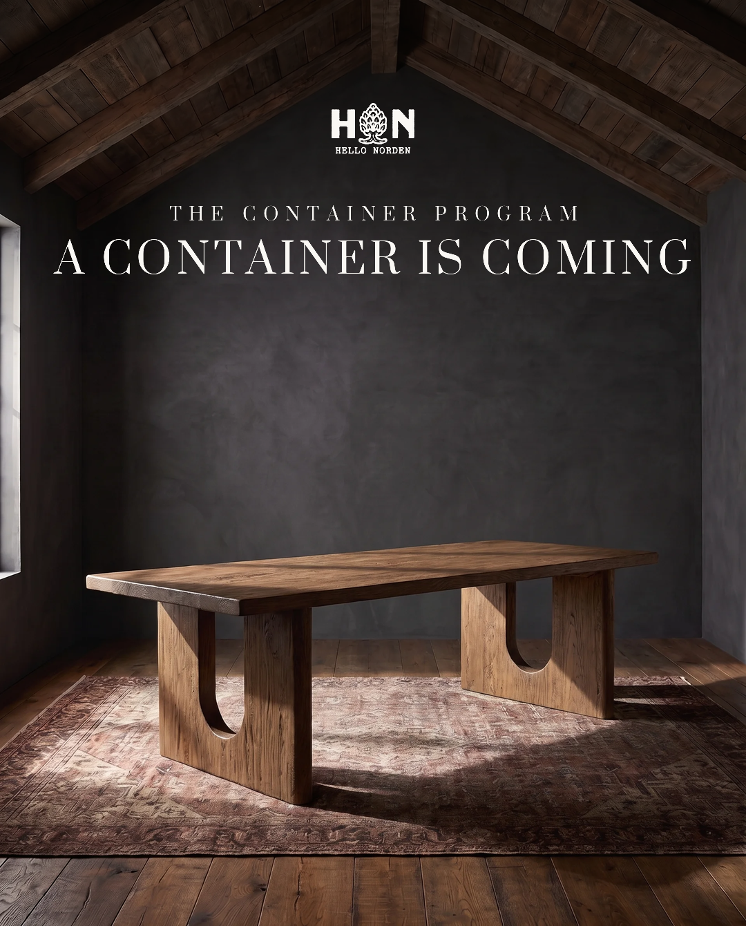 The container program — a container is coming. A solid reclaimed elm dining table in a vaulted room.