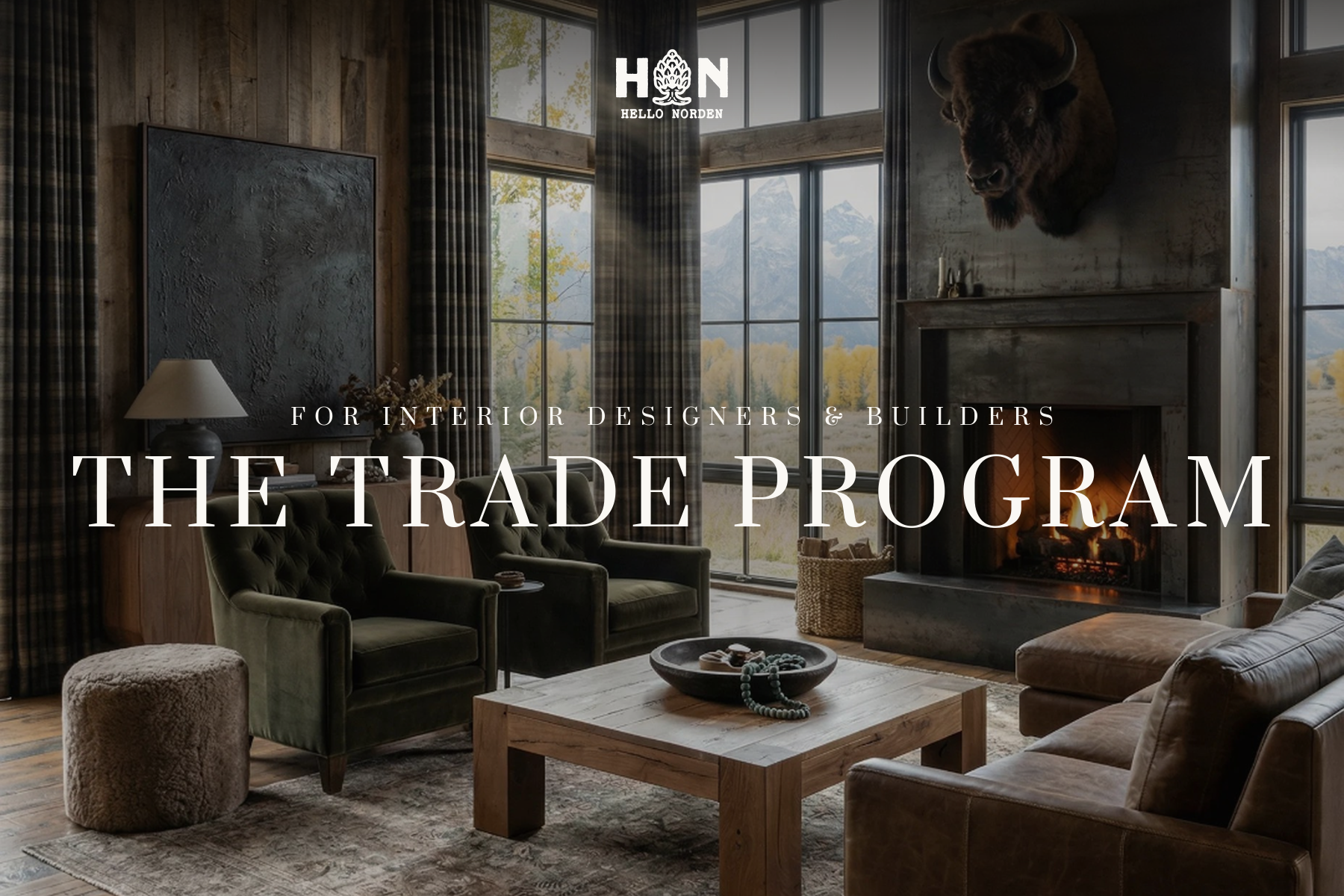 The Hello Norden Trade Program — a designed mountain great room with a lit fireplace