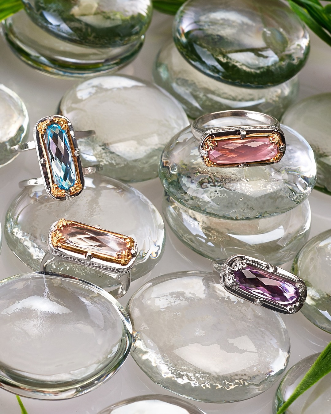 Anatoli gemstone rings in blue topaz, rose quartz, champagne and amethyst